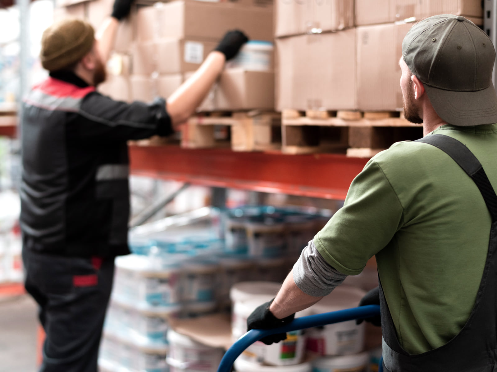 Warehouse loading area with several workers at work